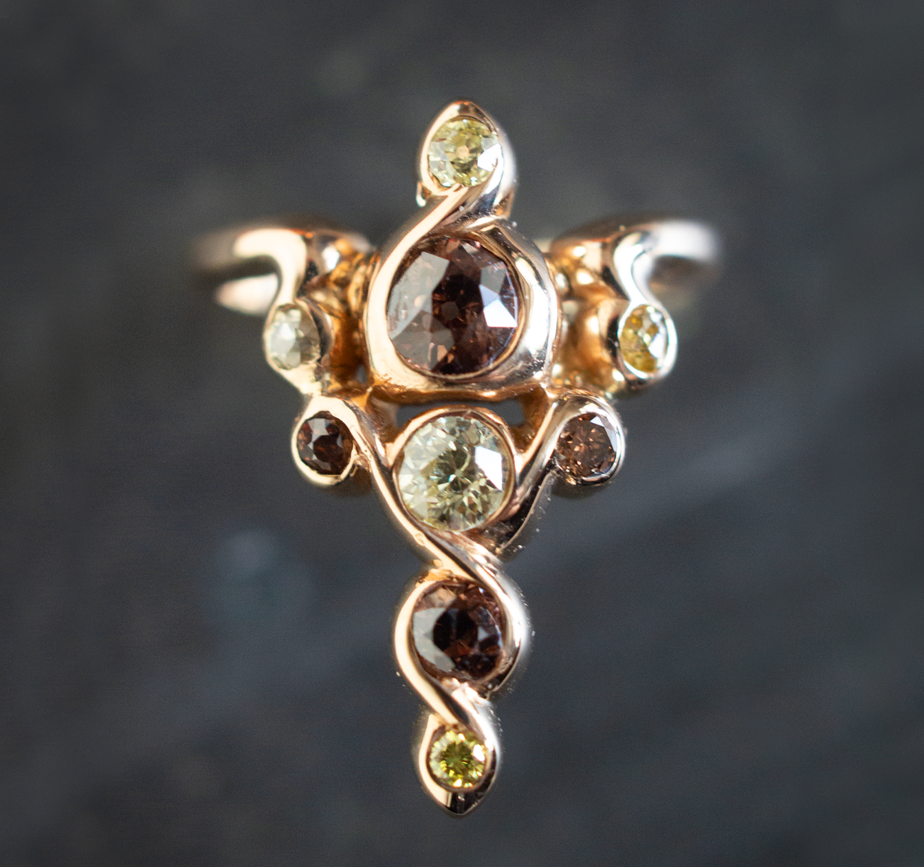 Art Nouveau Caduceus-styled vintage gold and colored diamond ring