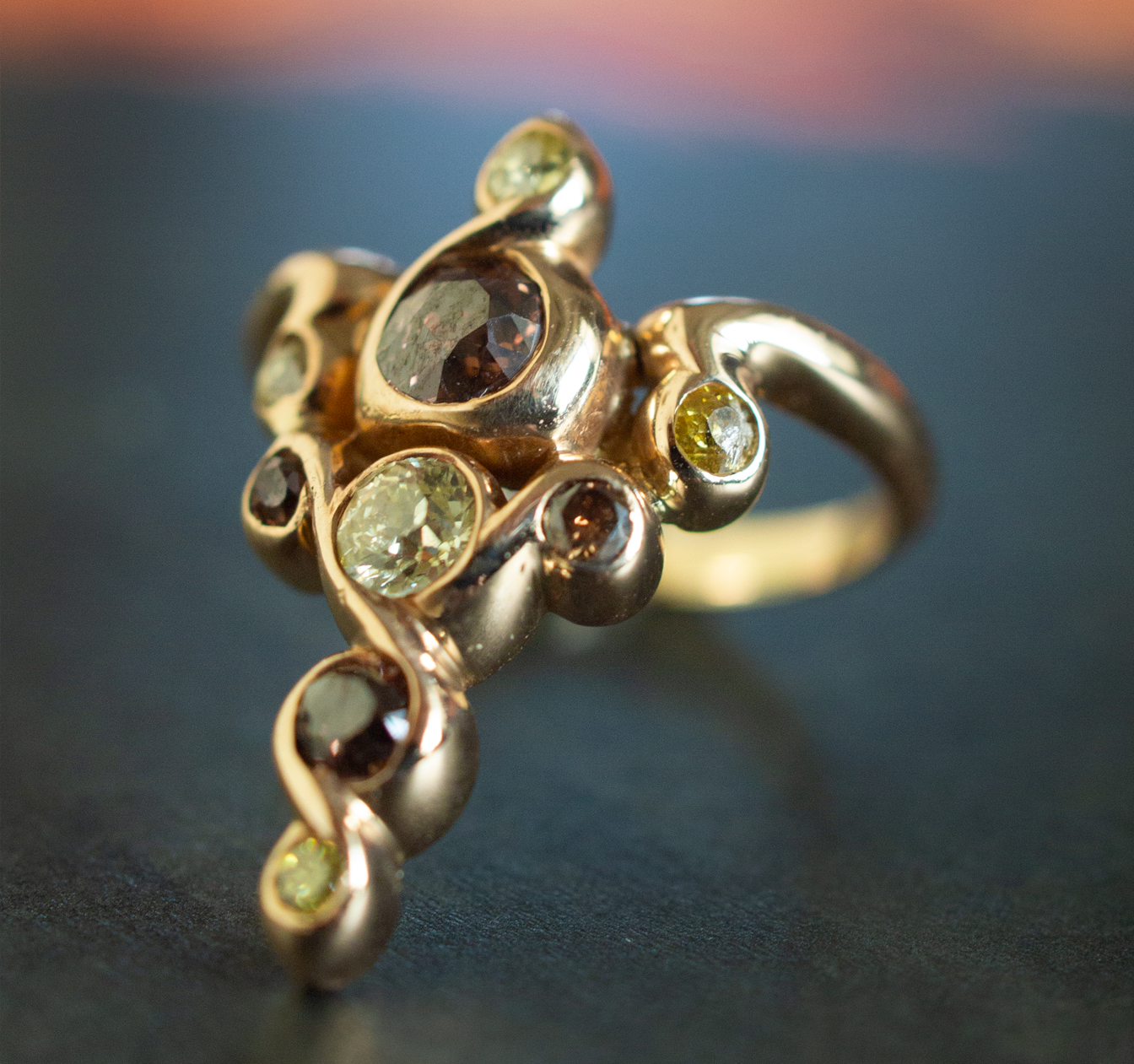 Art Nouveau Caduceus-styled vintage gold and colored diamond ring
