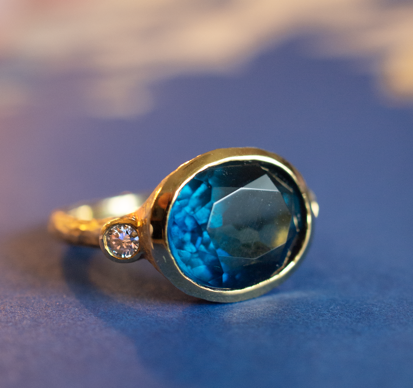 London Blue Topaz and diamond hand hammered 14k gold ring