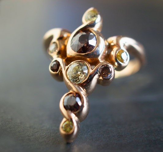 Art Nouveau Caduceus-styled vintage gold and colored diamond ring