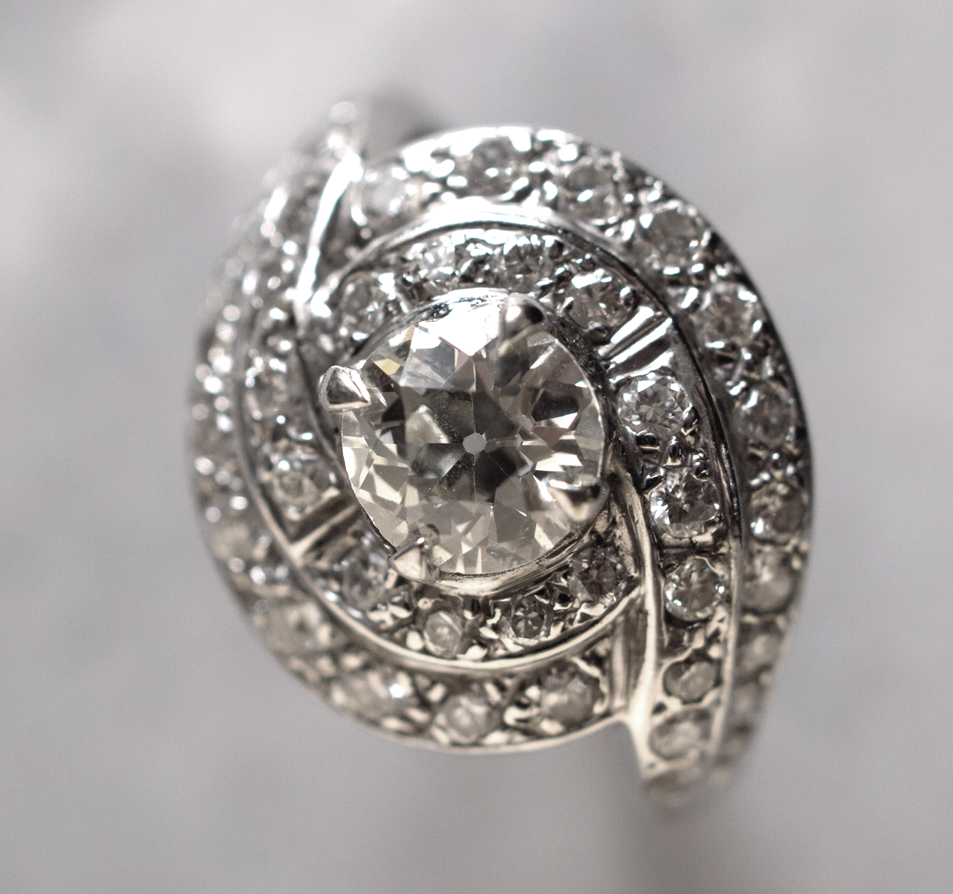 14K White Gold and Diamond Solitare Hurricane Cluster Ring