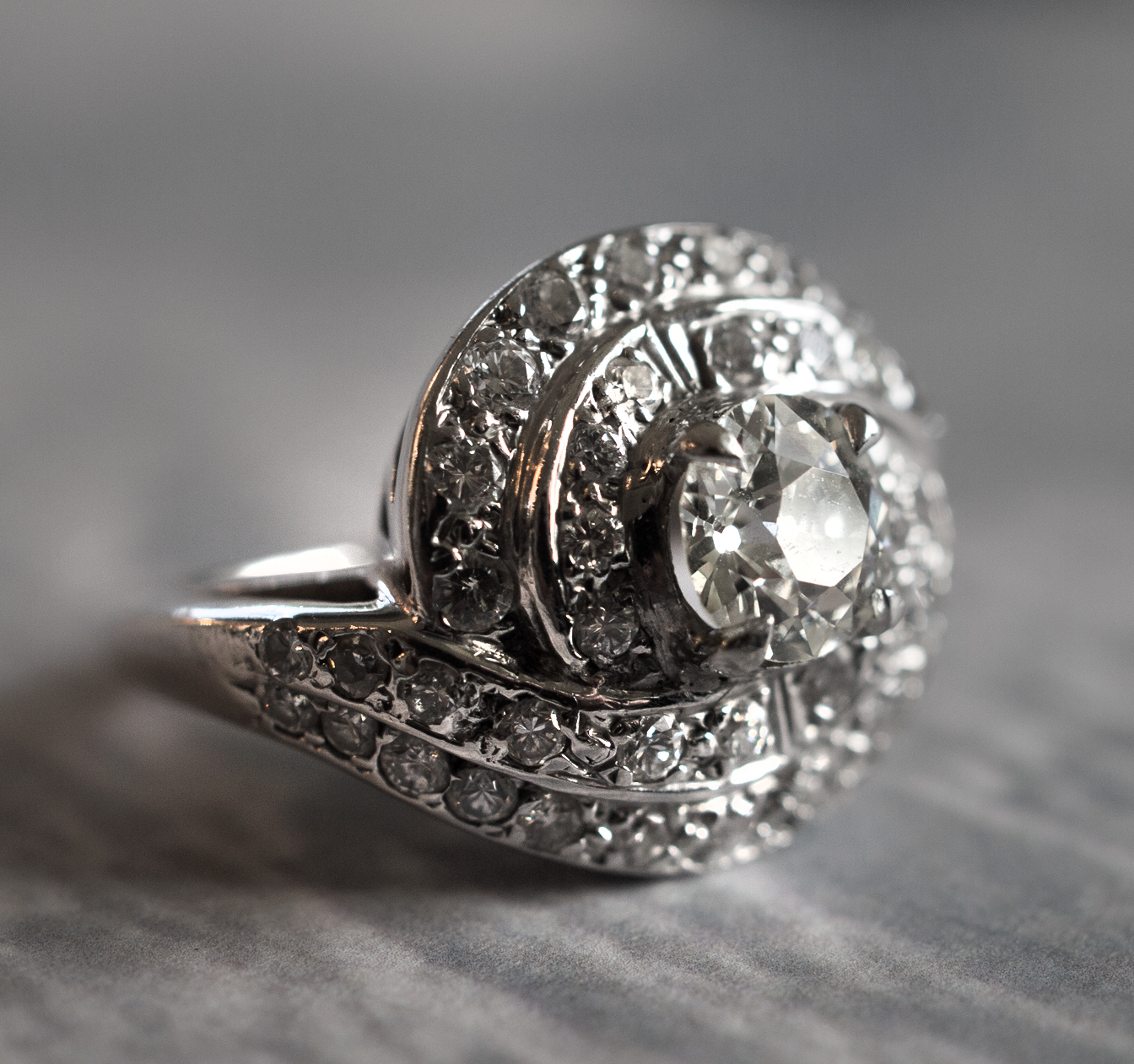 14K White Gold and Diamond Solitare Hurricane Cluster Ring