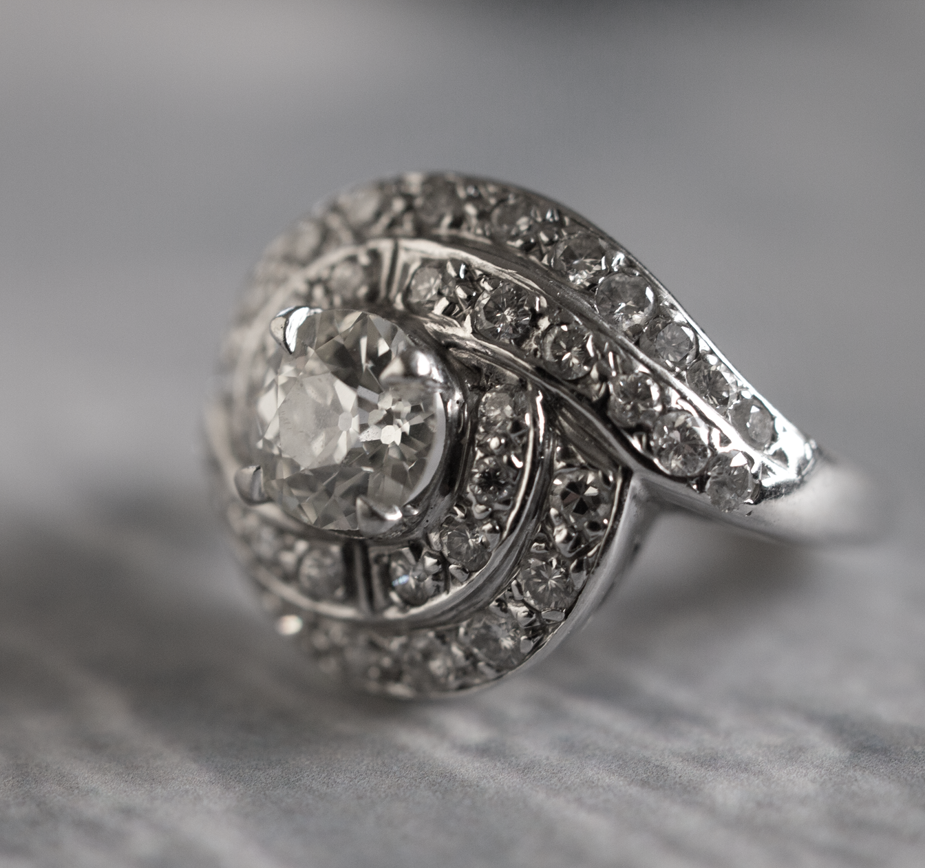 14K White Gold and Diamond Solitare Hurricane Cluster Ring